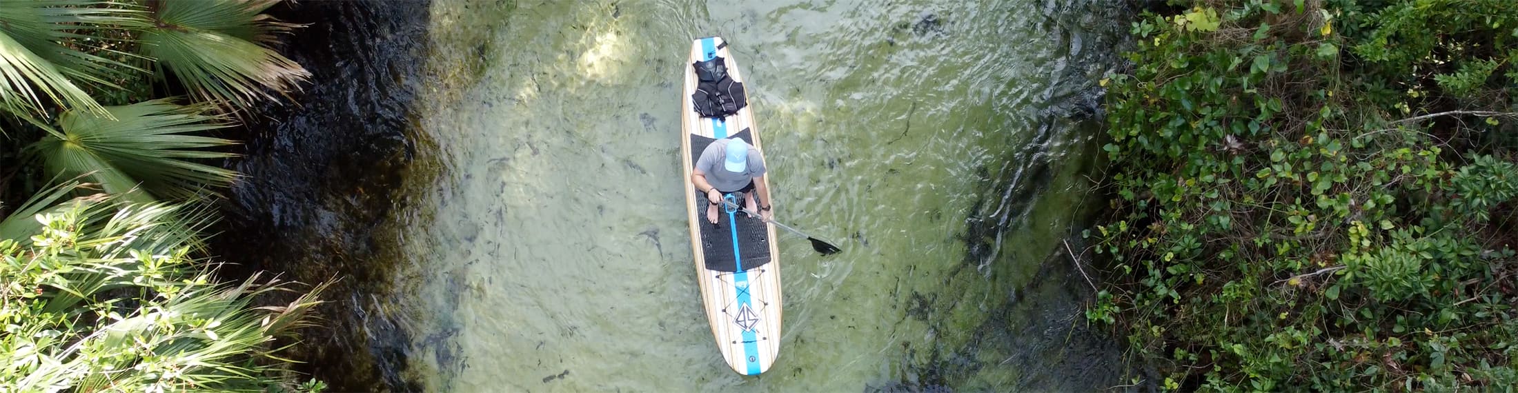 Ari Gunzburg Paddle Boarding on the Emerald Cut