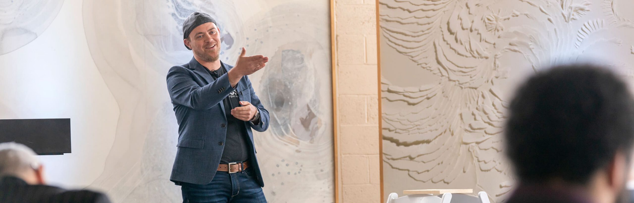 Ari Gunzburg Speaking to Crowd